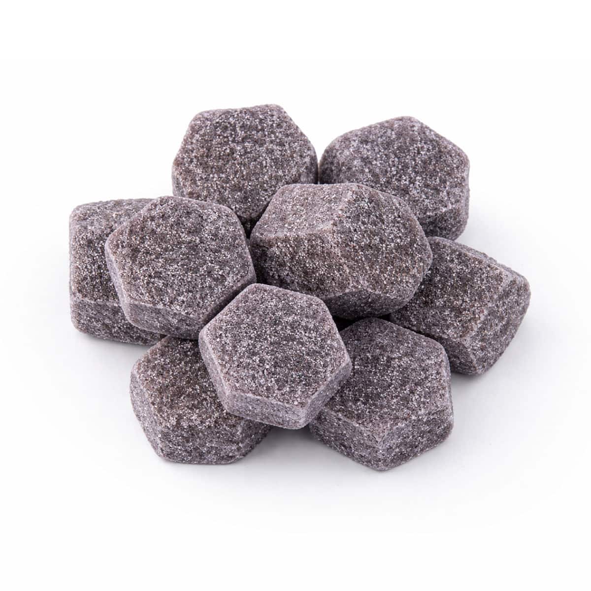 Assorted Banana Berry THCa edibles in hexagonal shapes for wellness.